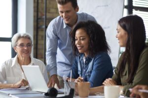 people smiling while conference room