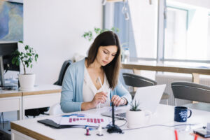 pretty woman working office